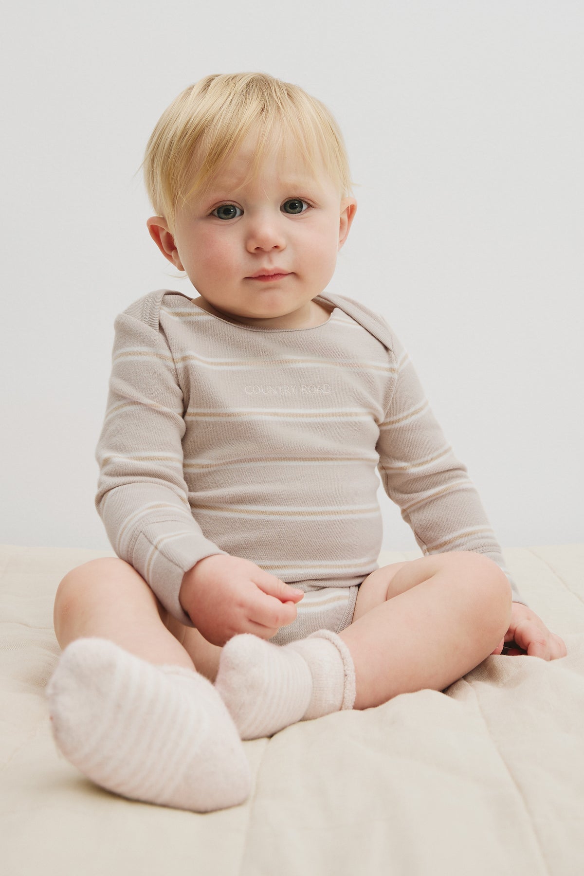 Organically Grown Cotton Stripe Logo Long Sleeve Bodysuit