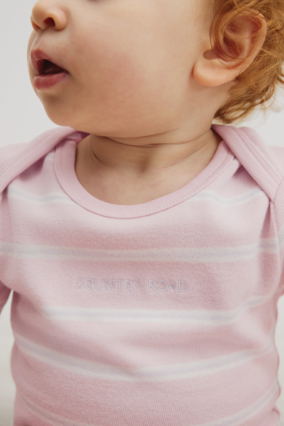 Organically Grown Cotton Stripe Logo Long Sleeve Bodysuit